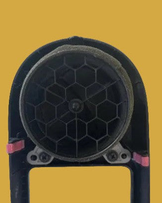 Black honeycomb filter on a yellow background
