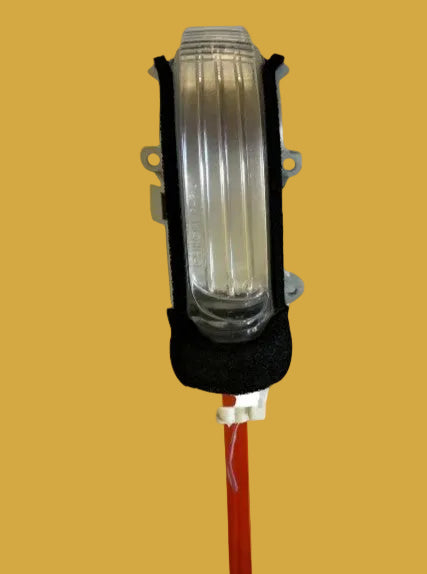 Light bulb with holder on a yellow background