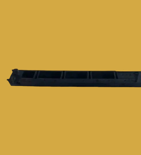 Black plastic tray on a yellow background
